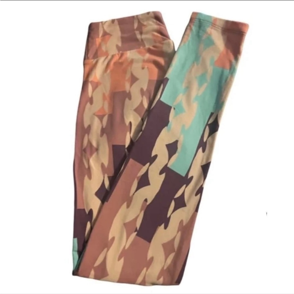 NWOT!  Geometric leggings in Cream, Baby Blue, Purple, Gray, & Pink